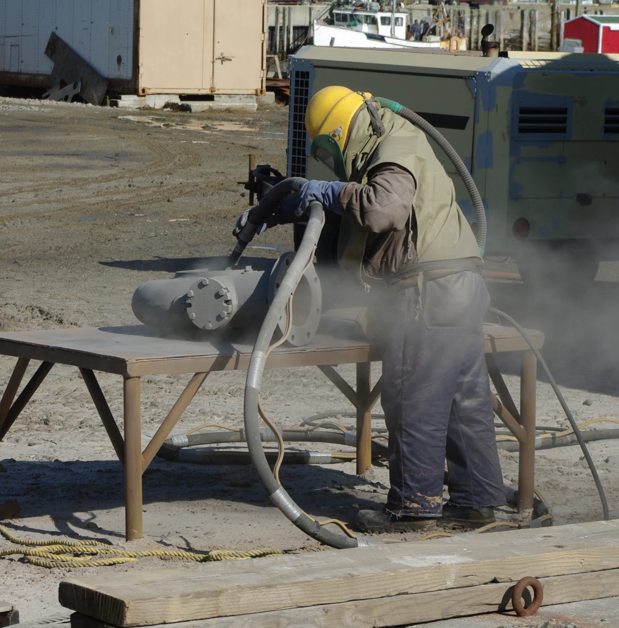 Person wearing safety gear for sandblasting